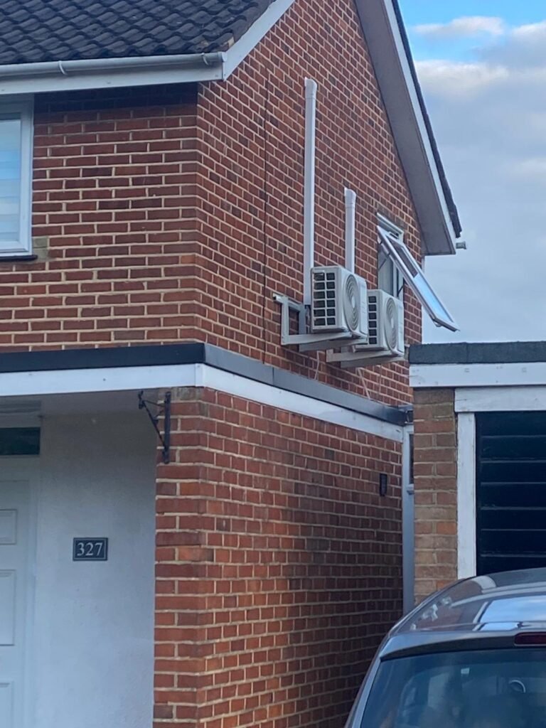 Commercial outdoor units on a flat roof with ductwork