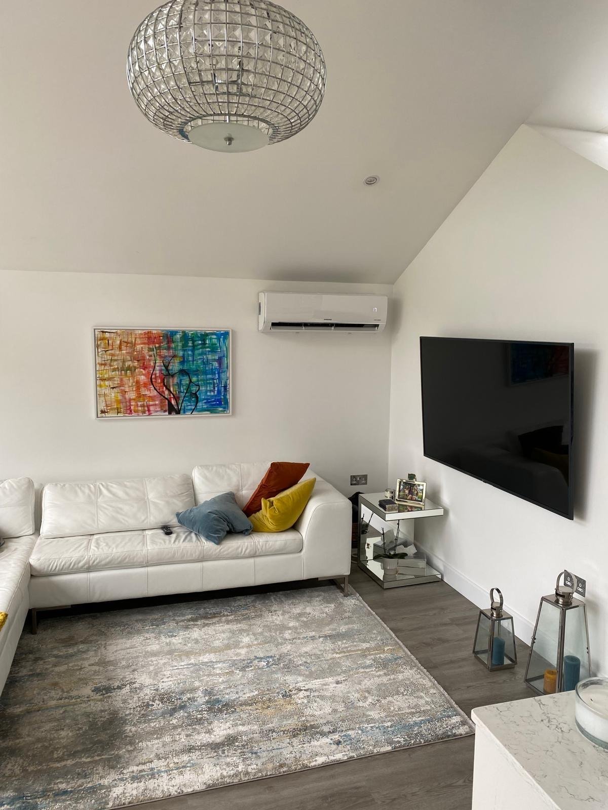 Settling down in a cool living room, remote in hand